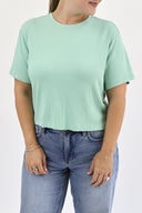 Model wearing Everyday Tee in Pistachio color.