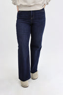 Model wearing Tummy Control Wide Leg dark wash in our 40" inseam cut to length.