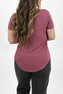 Model wearing AJ Basic V-Neck Tee in mauve.
