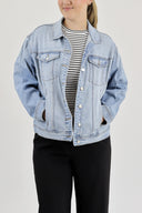 Model wearing RFM Boyfriend Denim Jacket showing the pockets.