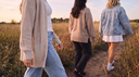 3 women walking outside on trail wearing 3 different AJ Fall layered outfits. Banner to click into for fall favorites collection.