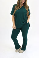 Model wearing Ribbed Flare Set by AJ in evergreen color.
