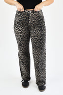 Front shot of model wearing RFM tummy control wide leg jeans in leopard wash