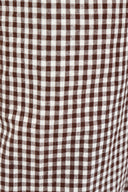 detailed view of AJ Linen Barrel Pants in brown gingham print.