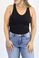 model wearing Open Back Tank in black ribbed material. 