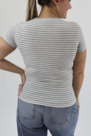 Back shot of woman in grey and grey striped, ribbed, full length, short sleeve, crewneck tee