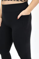 model wearing AJ Tummy Control Leggings with new extended panel and side pocket detail.