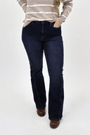 Model wearing Tummy Control Flare Jeans by RFM - dark wash