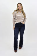 Model wearing Tummy Control Flare Jeans by RFM - dark wash
